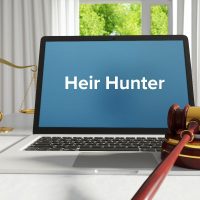Heir Hunter – Law, Judgment, Web. Laptop in the office with te Heir Hunter – Law, Judgment, Web. Laptop in the office with te